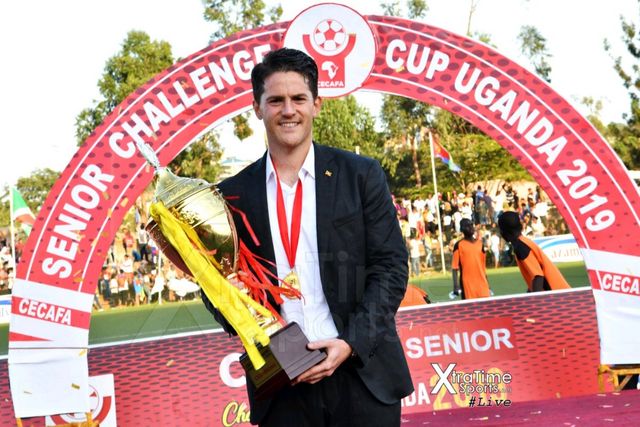 McKinstry poses with CECAFA title
