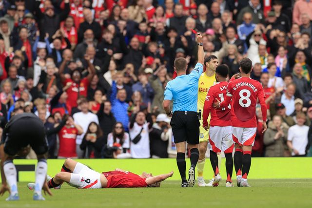 Martinez is shown a red card in Villa's vital game (©AFP)