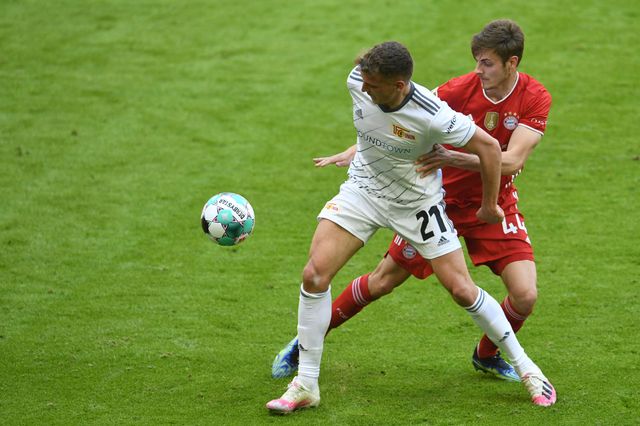 Stanisic (#44) on his Bayern Munich debut against Union Berlin in April 2021 (©AFP))