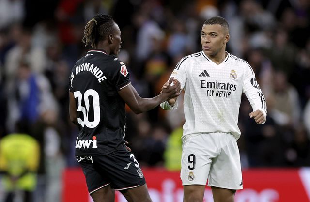 Yan Diomande shaking Kylian Mbappe's hand, playing for Leganes against Real Madrid (©Maria Gracia Jimenez/Soccrates/Getty Images/Gallo Images)