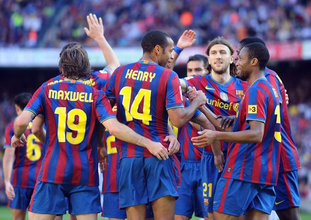 Henry celebrating with his Barca teammates in 2010 (©Denis Doyle/Getty Images)